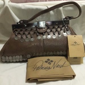 Metallic dark tan purse.